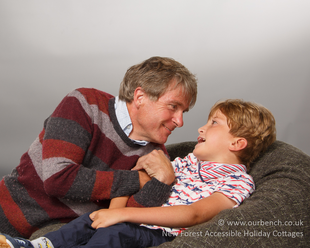 Sam sharing a quiet moment with his dad during a photography session
